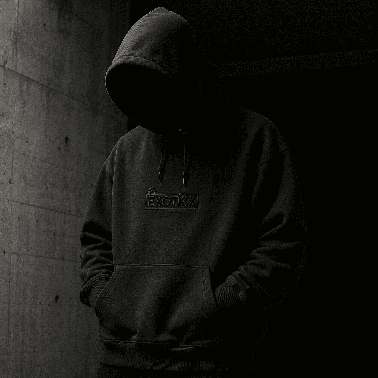 Model wearing the heavyweight Mr. Exotixx hoodie — Drop 001